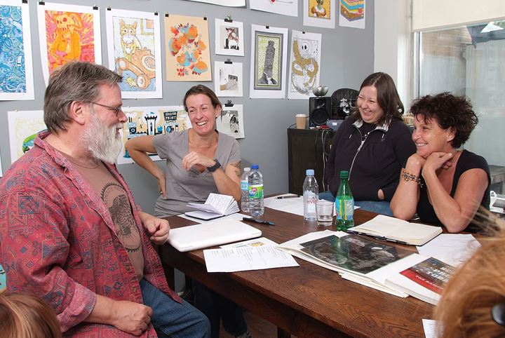 Andy discussing screenprinting with a class